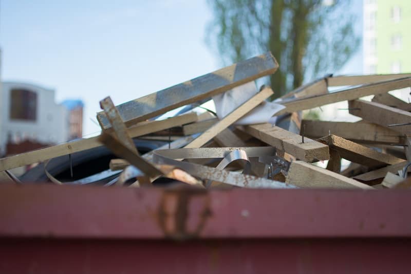 dumpster filled with junk.