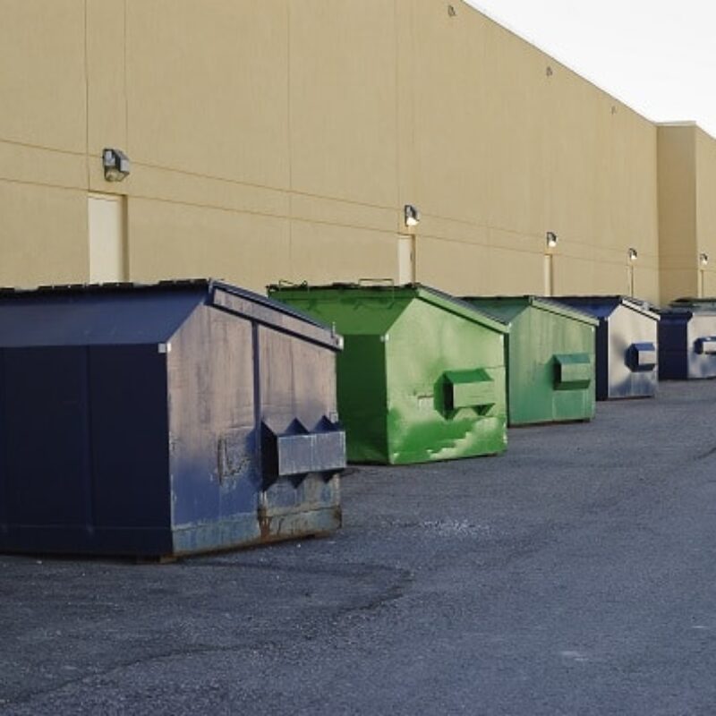 Commerical Dumpsters Row of Dumpsters