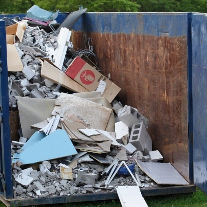 Dumpster,With,Construction,Debris